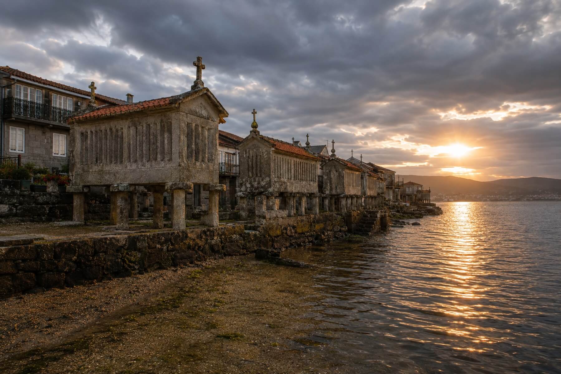 Stone granaries along the waterfront in Combarro, Galicia